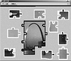 36 Murphy, Picco, Roman Fig. 10. RoamingJigsaw. The top two images show the puzzle trays of the black and white players while they are disconnected and able to assemble only their selected pieces.