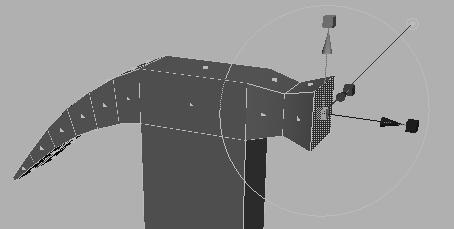 Lesson 1 > Using the poly extrude manipulator 3 Select Edit Polygons > Extrude Face again and move the face outward again.