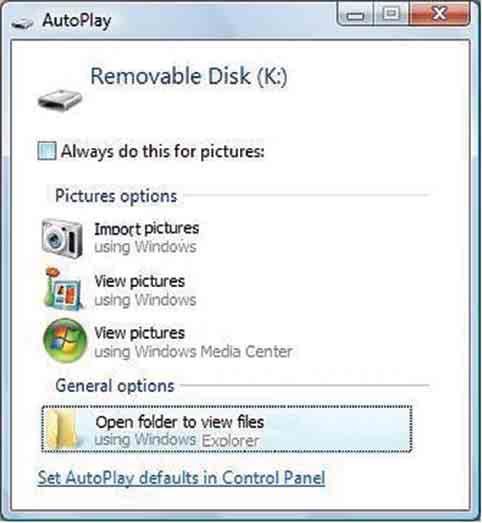 Copying images to a computer without PMB 3 Click [Open folder to view files] (For Windows XP: [Open folder to view files] t [OK]) as the wizard screen appears automatically on the desktop.