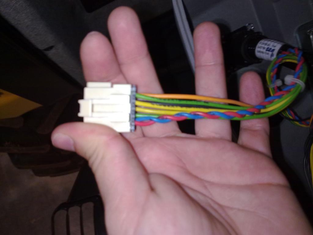 The pin-out for the white connector is as follows: Of which, these pins are of relevance: Function Pin Wire Color Power A Orange Ground B Black TX (transmit) E