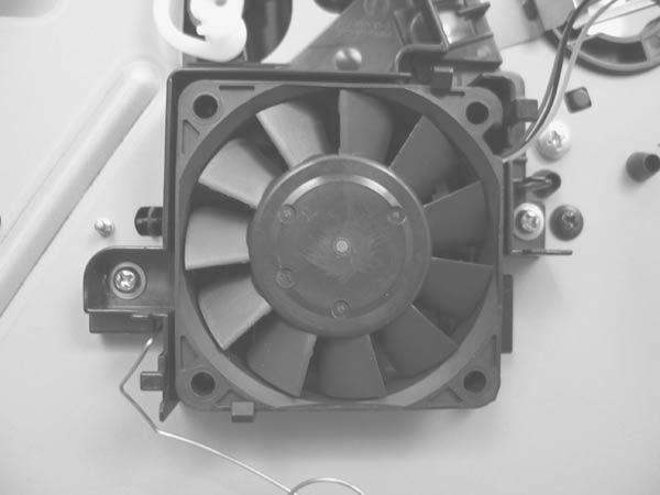 To remove the fan only: Release the metal static clip, release two tabs (callout ), and then remove the sub fan.