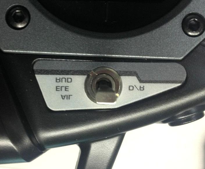 The digital trim switches can t be centered visually. Each time you push them up or down your radio increments or decrements an internal digital trim value.