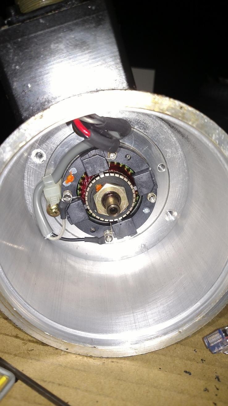 Construction Steps: Encoder Install: The rotary encoders work by mounting on the shaft of the motor. Optimally you would mount the encoders under the cover of the motor.