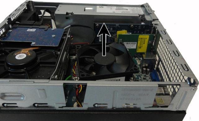 Disconnect the fan cable from the system board connector labeled CPU_FAN (1), and then loosen the four captive Torx T15 screws (2) that secure the fan sink to the system board tray.