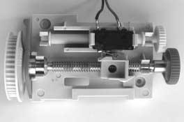 5. Initial operation of control unit Control 44 / Control 45 Now turn with the small knurled wheel (3) the adjusting spindle, until the reference point switch (4) is actuated by the carriage () (see