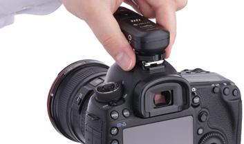 5. Insert the Transmitter s hot shoe into the camera s hot-shoe mount, and tighten the