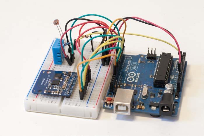 Chapter 3 11. Finally, connect the common pin between the photocell and resistor to the analog pin A0 of the Arduino board.