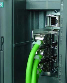 Connecting 5.1 Wiring Procedure: 1. Insert the PROFINET connector into the drive unit. 2. Open the front door of the C240 PN and insert the PROFINET connector into the X11 P1, X11 P2 or X11 P3 socket.