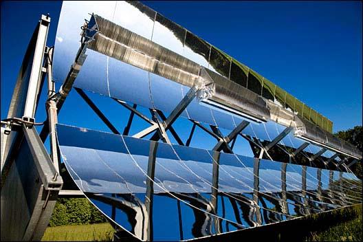 - parabolic mirrors are used in a method of capturing solar energy for commercial purposes; they use long rows of concave parabolic mirrors that reflect the sun's rays at an oilfilled pipe located at