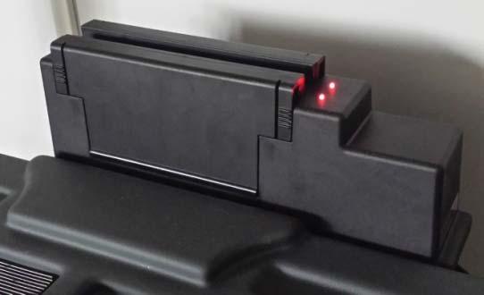 Charge The Batteries Remove the Control Unit from the platform, remove the power cord normally placed in the printer compartment, connect the cable to the Control Unit and to a