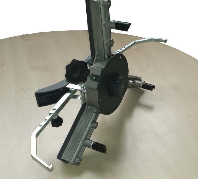 Clamp positioned with one arm in the 12 o clock Wheel diameter adjustment knob to the right,