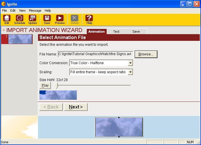 IMPORTING ANIMATION 39 8. You can overlay text on top of the animation if you desire. You can also enter the Time, Temperature or Date by using the buttons. For this exercise, enter the Time.