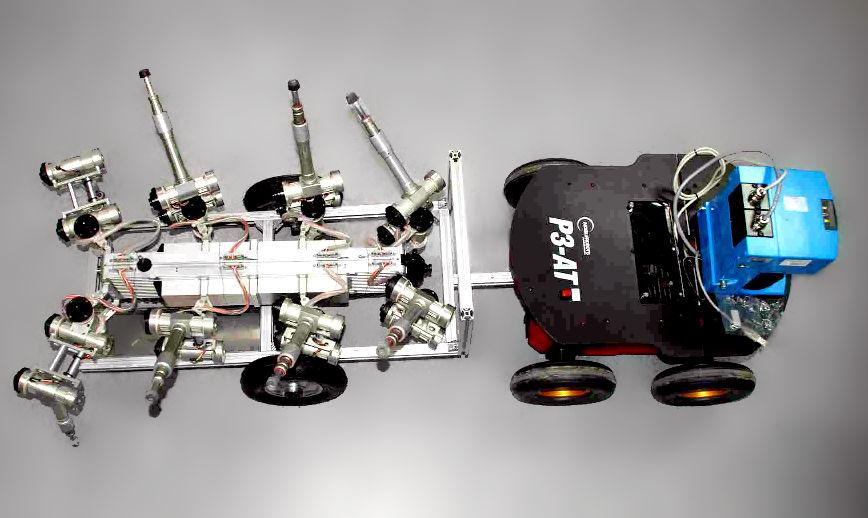 42 CHAPTER 3: COORDINATING HETEROGENEOUS TEAMS OF ROBOTS Figure 3.3: Example of a marsupial robot team. A versatile but slow legged platform is deployed by a faster wheeled robot.