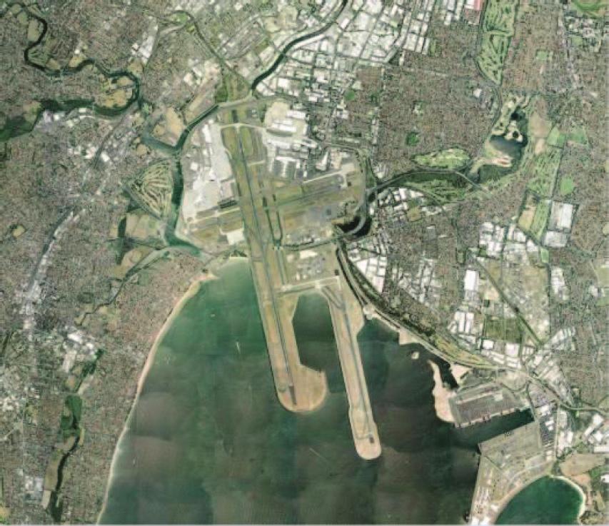 (a) (b) Runway Airplane Residential River Ocean Meadow Industrial Bare Soil (c) FIGURE 8. (a) The whole image for image annotation. (b) The image ground truth.