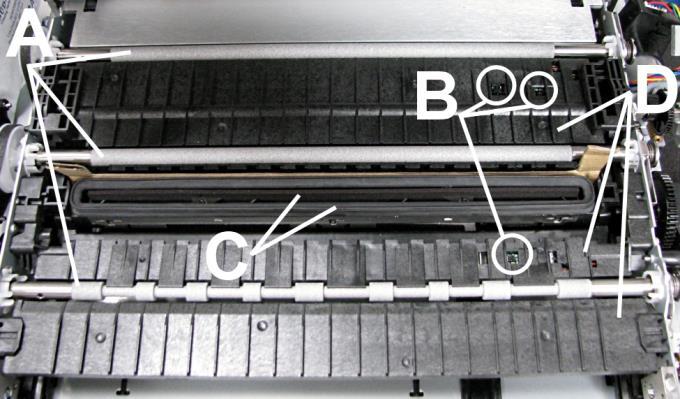 SECTION 4 MAINTENANCE Print Engine Areas in the Print Engine can become glazed with a buildup of dust, paper lint and accumulated ink and have to be cleaned regularly. Open the Top Cover.