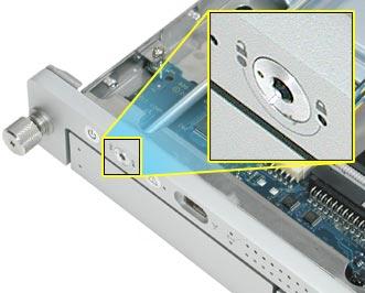 2. To install the locking rod, insert the end of the rod with the key hole into the port on the front bezel.