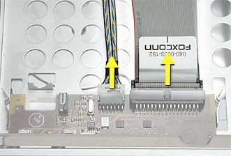 Procedure 1. Disconnect the FireWire and front panel board cables from the board. 2.