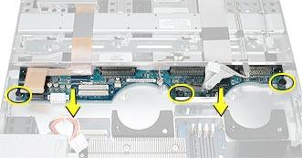 front panel board cable FireWire cable 2. Release the three thumb screws that secure the drive interconnect board to the chassis.