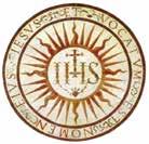 There are three compartments in the upper portion of the shield because the school is dedicated and exists in the Name of the Father, and of the Son, and of the Holy Spirit.