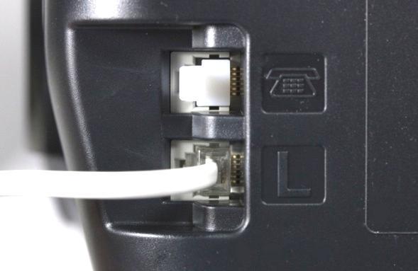 Fax to hone Line onnection lug the provided phone cord into the L jack in the rear of