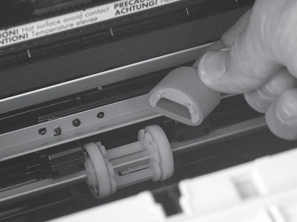 3. Gently pull the roller up and out of the product. Figure 5-45 Remove the product pickup roller (3 of 5) 4.