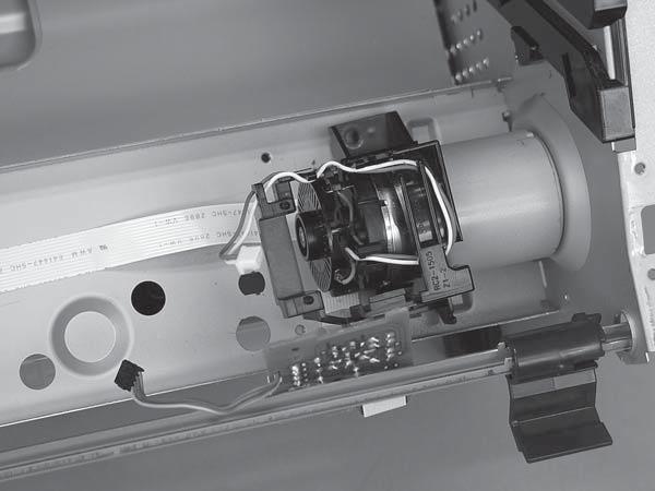 Remove the main motor wire-harness from the retainers (callout 4) on the mounting bracket.