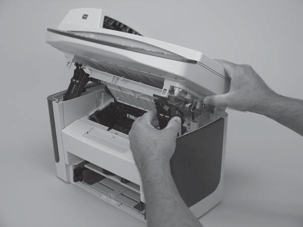 Link assemblies and scanner support-frame springs 1. Push the print-cartridge access button and raise the scanner assembly until it is locked open. 2.