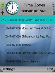Time Zone. Press the left softkey to select the Time Zone setting. A list of multiple time zones will be displayed. The selected time zone is indicated by the <*> symbol.