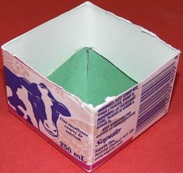 B: Volume 1. a) Cut the top off the milk carton to form a prism. b) On a piece of construction paper, draw a net for a pyramid that has the same base and height as the prism.