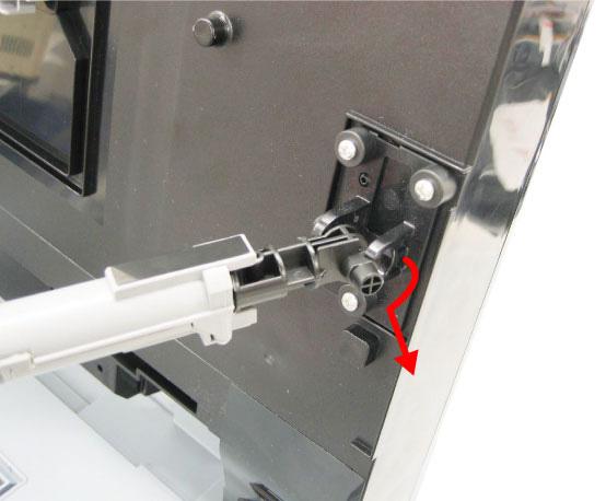 (20) Scanner stopper removal - While holding the stopper perpendicular to the scanner unit, slide the stopper in the direction indicated by the arrow
