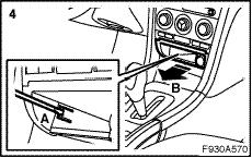 32 025 908 11 9-3 M07-, radio 1 Move the passenger seat to its rearmost position. 2 Disconnect the battery negative cable (-).