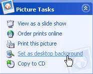 By default, the Windows XP theme is applied the first time you start Windows XP: Applying a Desktop Background The desktop background can be customized with a picture, texture, or color.