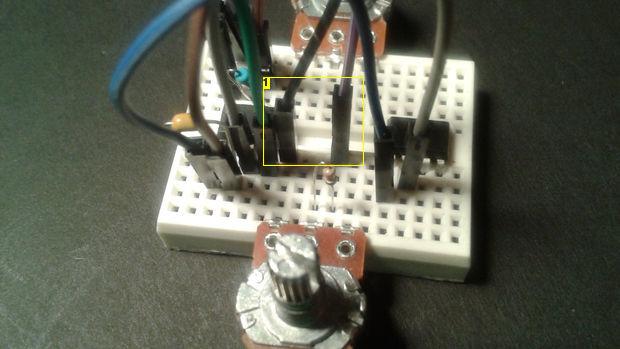 side potentiometer between the center pin and