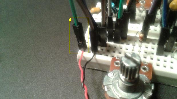 1. The second speaker wire is held in place with the loose