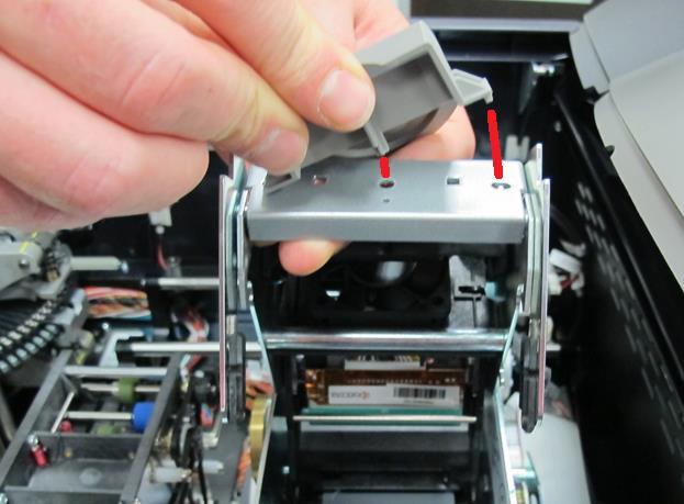 To re-install the image printer lid cover, follow these steps: 1) Line up the two hooks and the center post