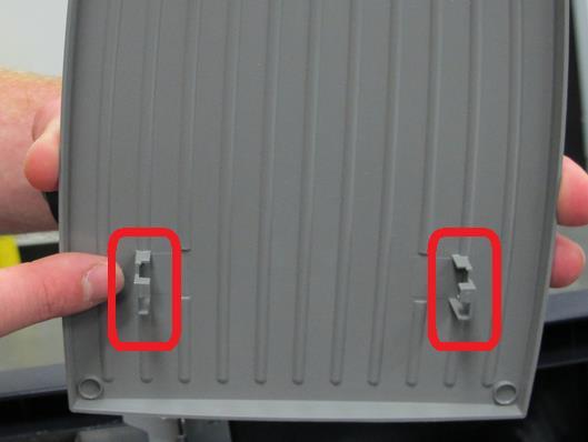 3) Examine the replacement cover and the sheet metal of the lid.