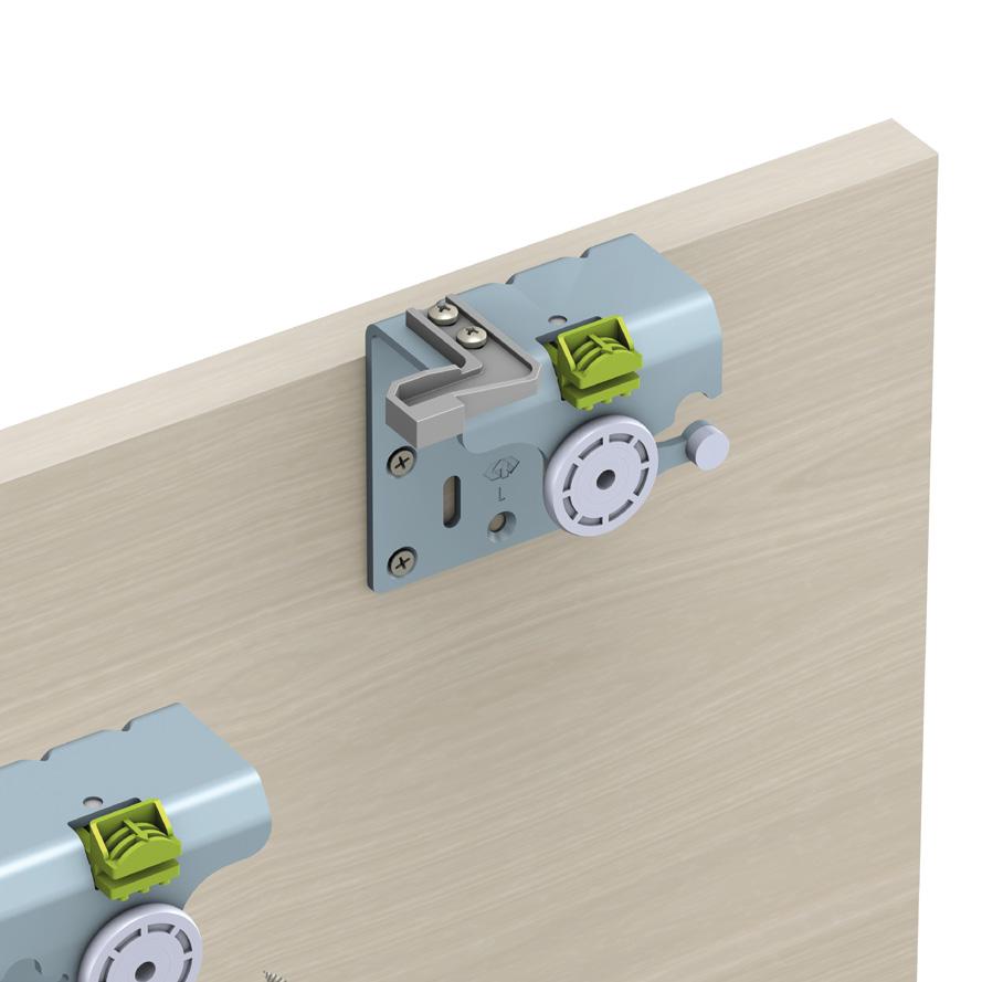 Follow the drilling scheme of the door to correctly assemble the upper rollers and the lower guides.