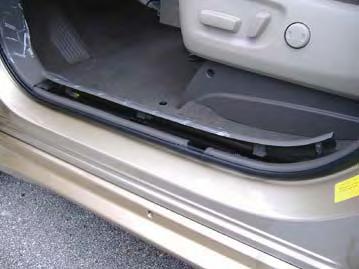 5. By hand pull up on driver s door scuff plate