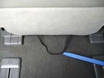 Remove driver s headrest by pushing release button and