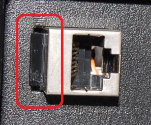 3 - Ethernet Jack Replacement Procedure Figure 3-5 - Ethernet Jack with Black Clip (REAR VIEW) 9) If you are removing an Ethernet jack with a black clip, follow these steps to loosen it: a) Use a