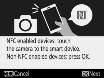 Touch the NFC antenna on the smart device to the camera N logo (N-Mark), then wait for SnapBridge to launch and proceed to Step 5.