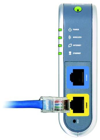 3. For setup or if using a wired connection, connect a standard Ethernet network cable from the Router s Ethernet port to your PC. Figure 4-2: Connecting to the PC 4.
