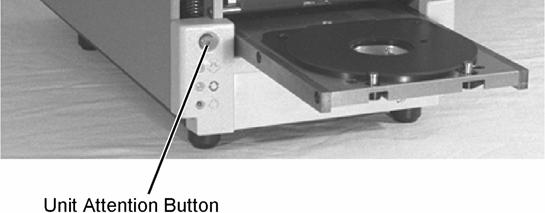 down the Unit attention button for eight seconds. See Figure 18. Figure 18 1.