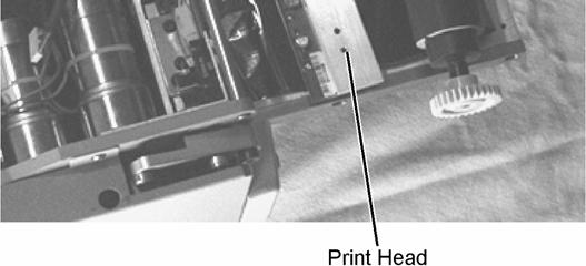 The print head is released from the print head assembly. Figure 6 10.