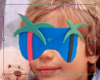 Use the move tool the arrow on the floating tool bar and drag the selection over the child s face so he looks like he is wearing the mask.