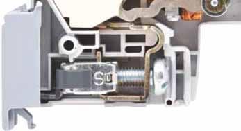 Under overload condition, a thermo-metallic element (bimetallic strip) deflects until it operates a latching mechanism allowing the main contacts to open.