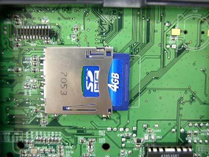 3.9 Installing SD Memory Card 1. Turn the printer upside down. 2. Remove the screw that fixes the memory card cover. Screw Memory Card Cover 3.