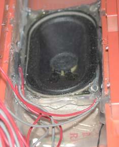 Using the fuel tank as a speaker baffle is quite easy.