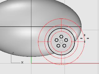 To draw the tires, you will draw the center of the torus tube a bit larger than the diameter of the wheel hub. The tube itself is slightly larger than the hub. This makes it dip into the hub.