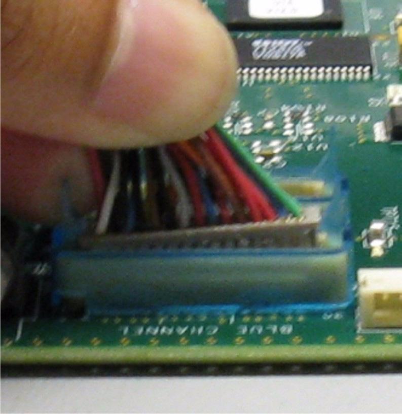 Line up the LVDS harness connector with the PCB connector and partially insert. (Figure 10) b.